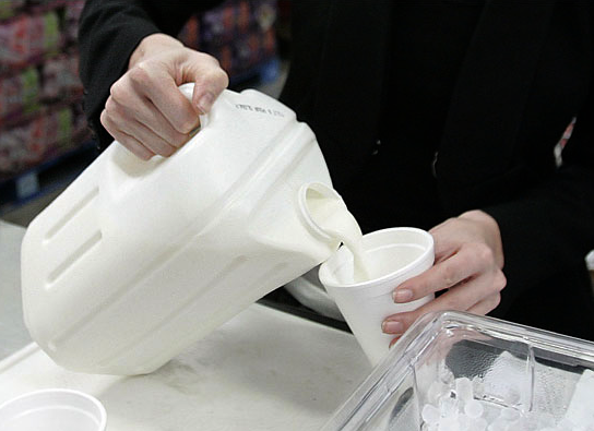 The New \"square\" milk jug in action. Photo from The New York Times